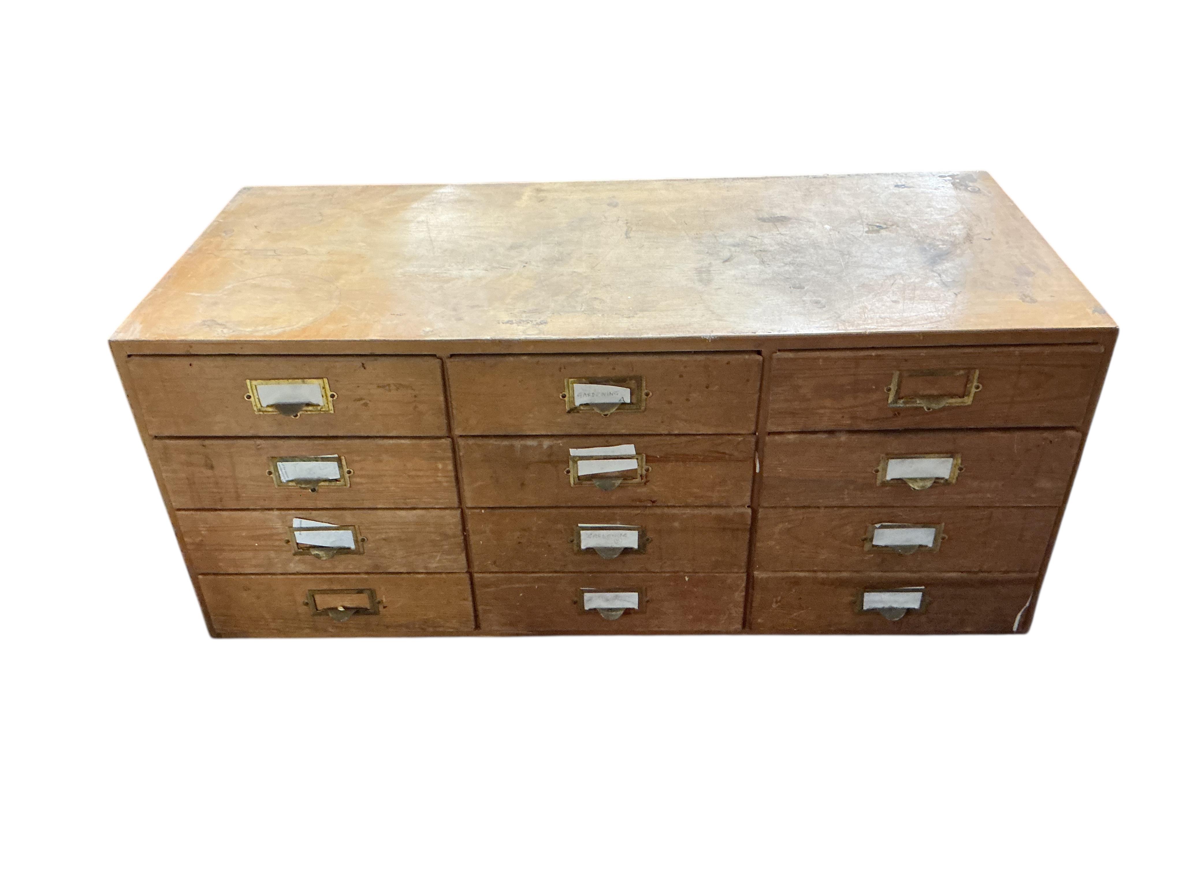 Two mid century pine and ply banks of nine drawers, each width 103cm, depth 45cm, height 43cm